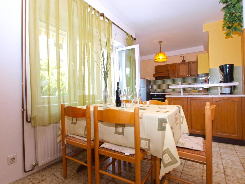 Kuchyň nebo kuchyňský kout v ubytování Apartments Nadia 1493