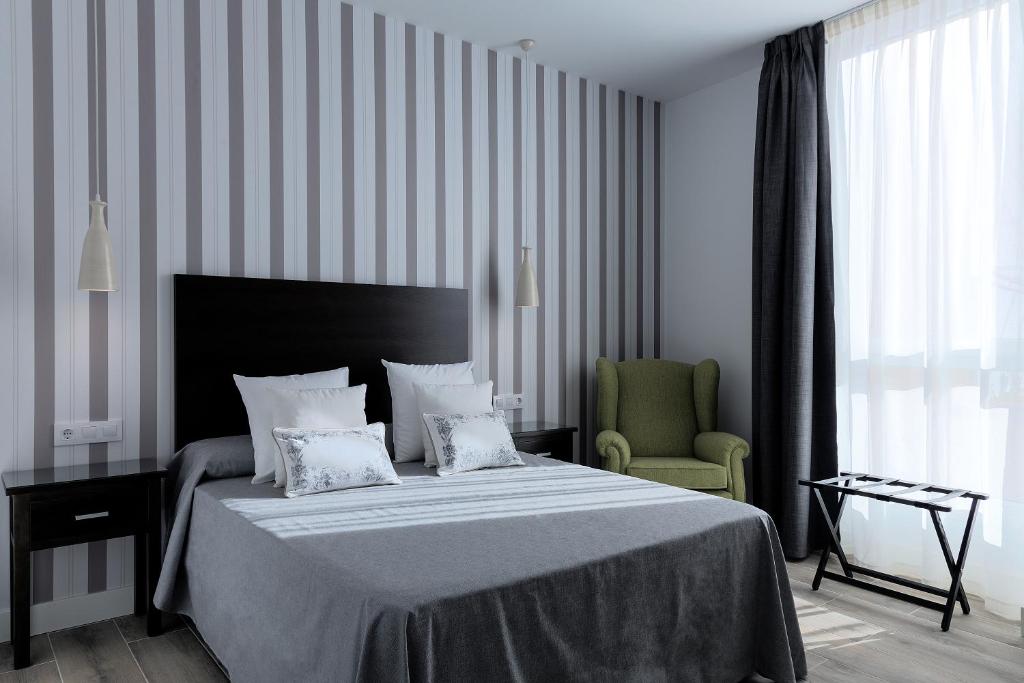 Posteľ alebo postele v izbe v ubytovaní Hotel Apartamentos MPD