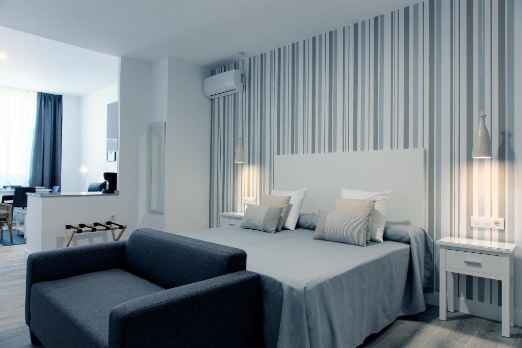 Posteľ alebo postele v izbe v ubytovaní Hotel Apartamentos MPD