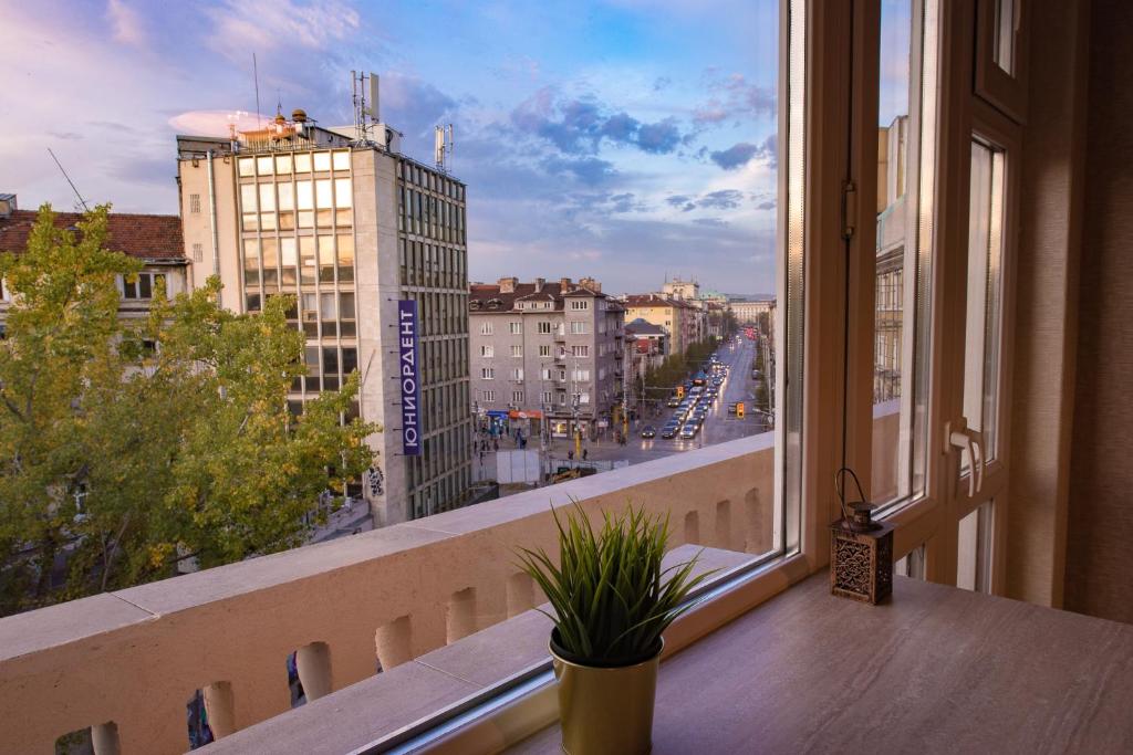 Nespecifikovaný výhled na destinaci Sofie nebo výhled na město při pohledu z apartmánu