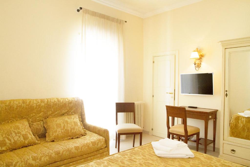TV a/nebo společenská místnost v ubytování Hotel Lanzillotta
