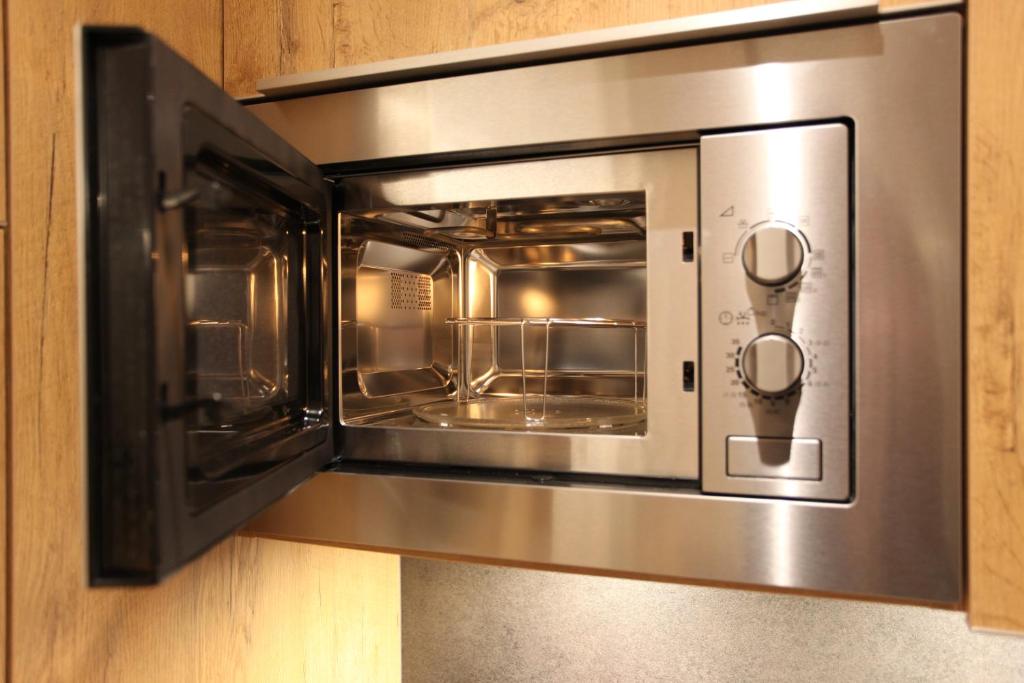 Cucina o angolo cottura di Engadin Lodge PREMIUM & PRIVATE