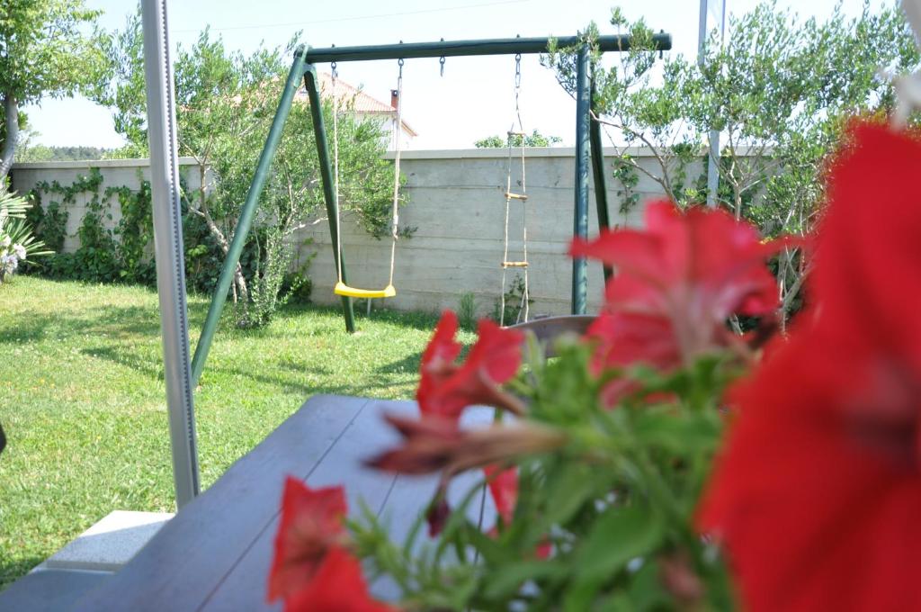 Vonkajšia záhrada v ubytovaní Apartments Smilja