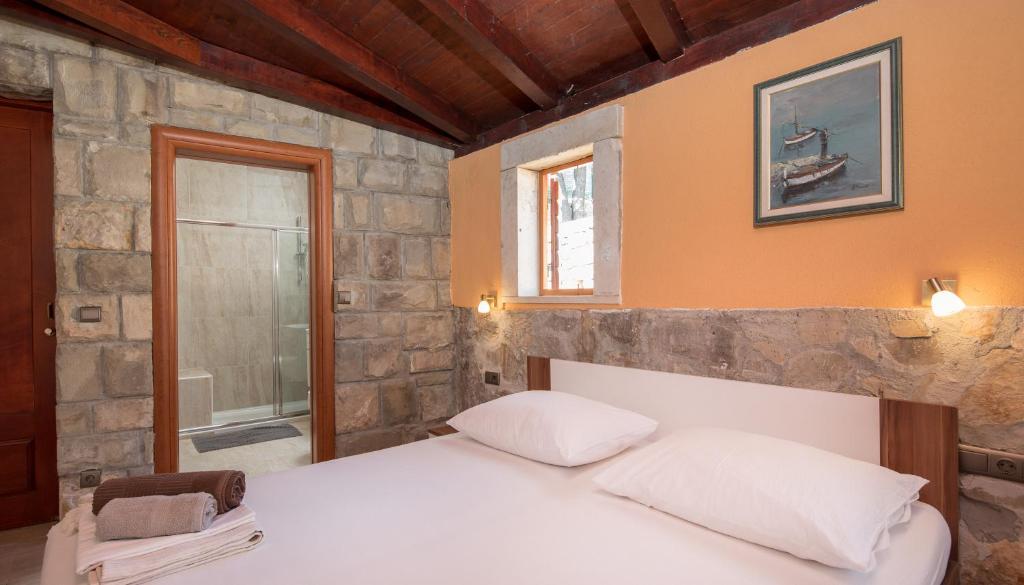 Posteľ alebo postele v izbe v ubytovaní Beach Time Villa