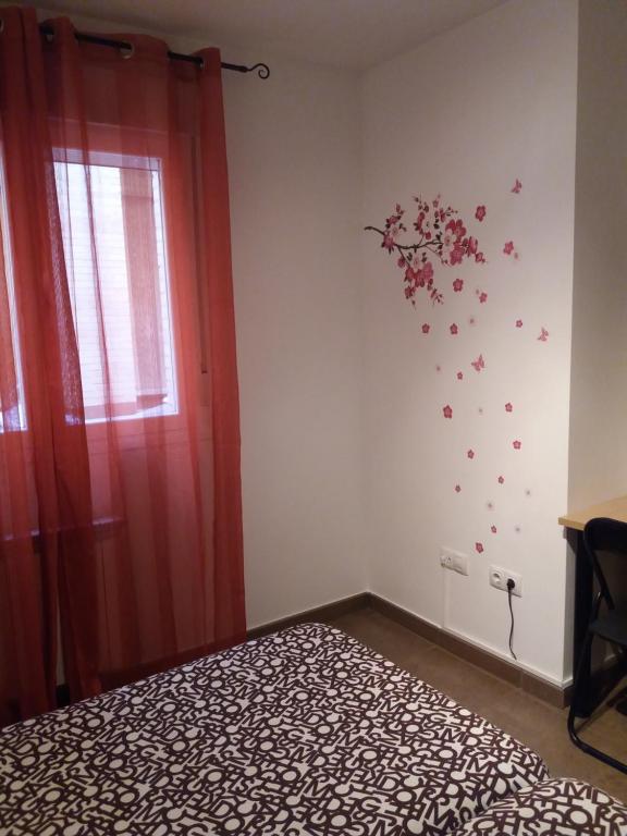Postel nebo postele na pokoji v ubytování Hostal la Catedral