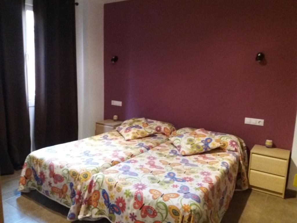 Postel nebo postele na pokoji v ubytování Hostal la Catedral