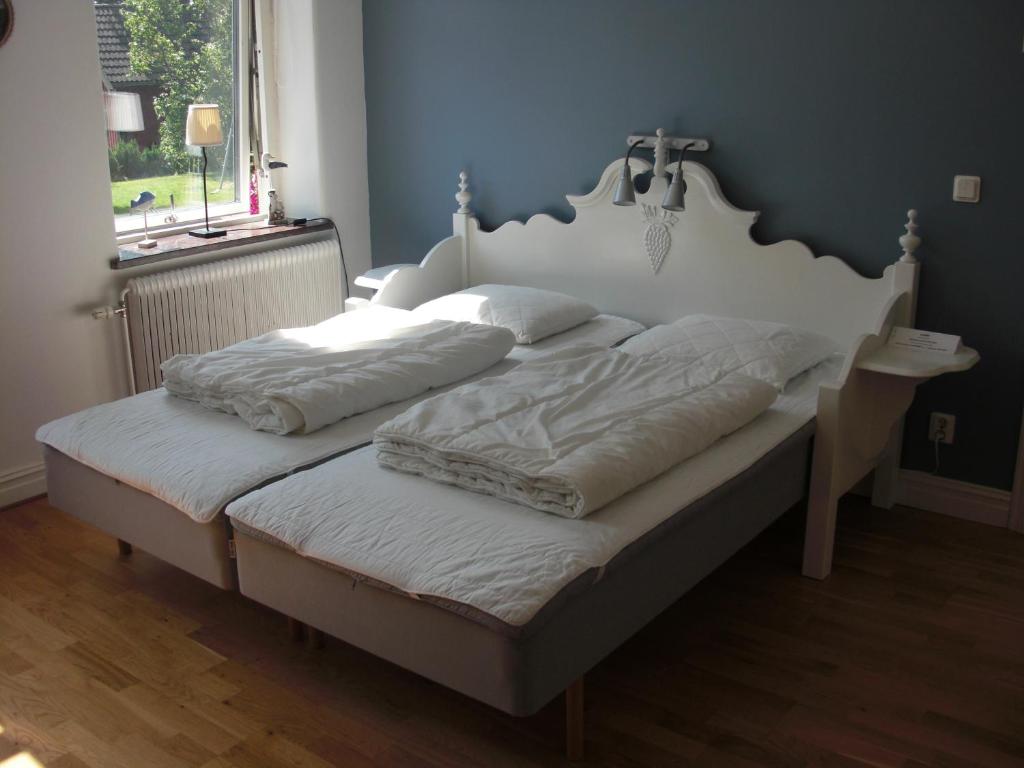 Postel nebo postele na pokoji v ubytování Hallandsåsen Hostel