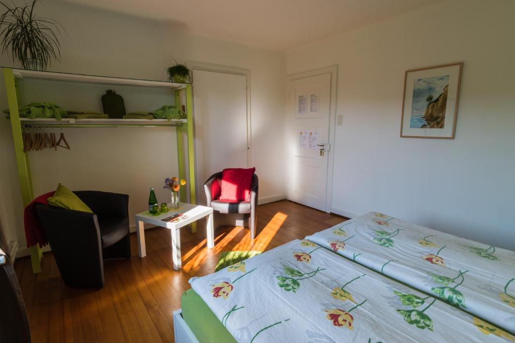 Voodi või voodid majutusasutuse B&B Kalimera Pratteln toas
