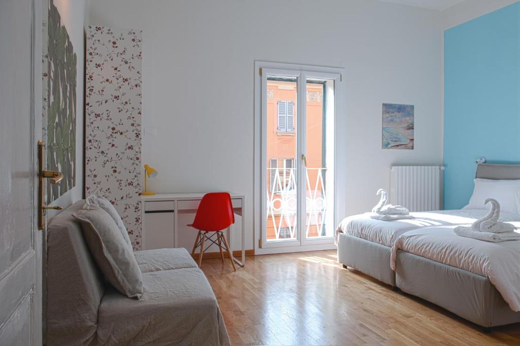 Posteľ alebo postele v izbe v ubytovaní Saragozza Apartments