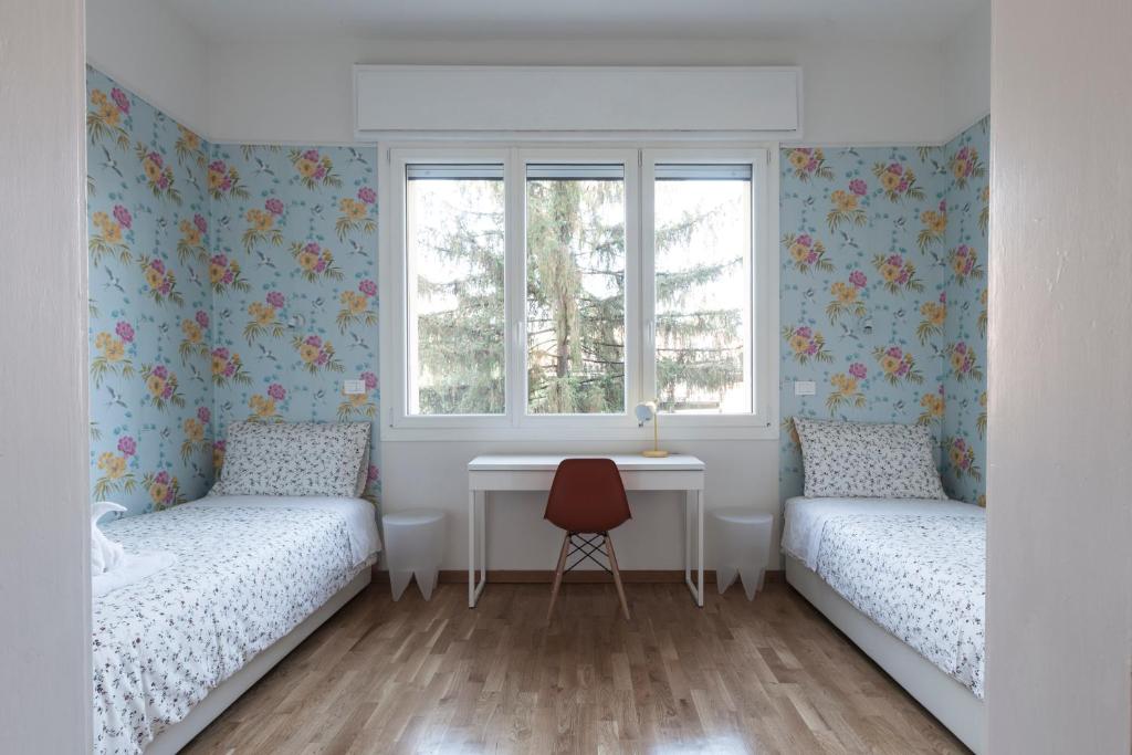 Posteľ alebo postele v izbe v ubytovaní Saragozza Apartments