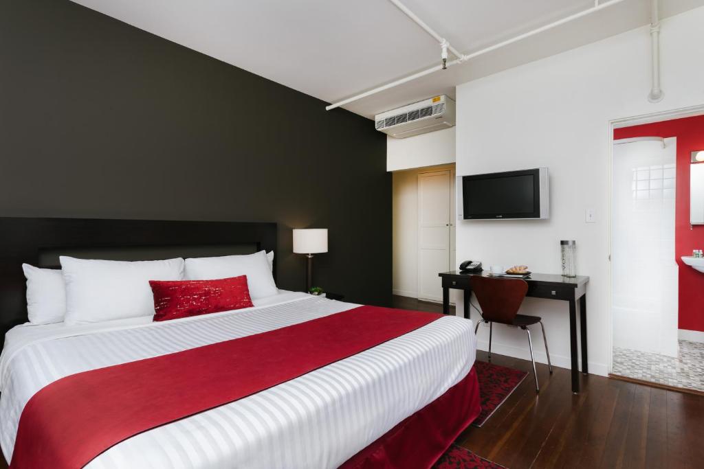 Postel nebo postele na pokoji v ubytování Moda Hotel