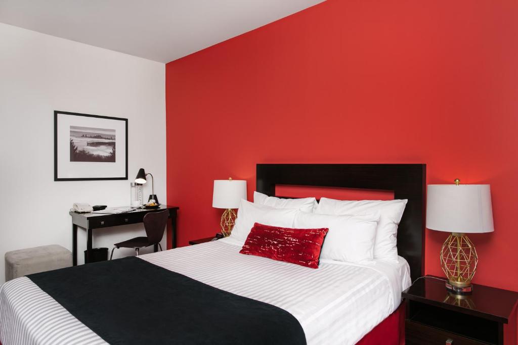 Postel nebo postele na pokoji v ubytování Moda Hotel