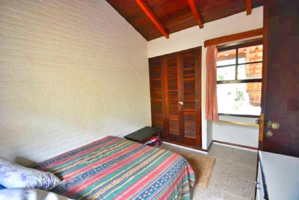  Casa Amarela Praia das Palmeiras