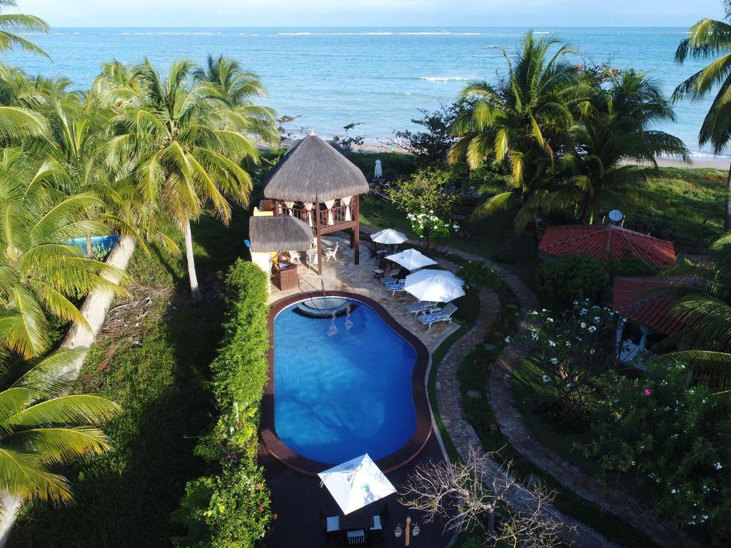 an aerial view of a resort with a swimming pool at Pousada Riacho dos Milagres in São Miguel dos Milagres