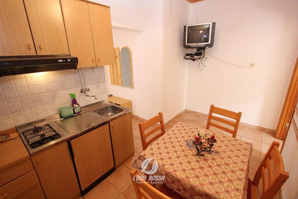 Kuchyň nebo kuchyňský kout v ubytování Apartments Vitomir