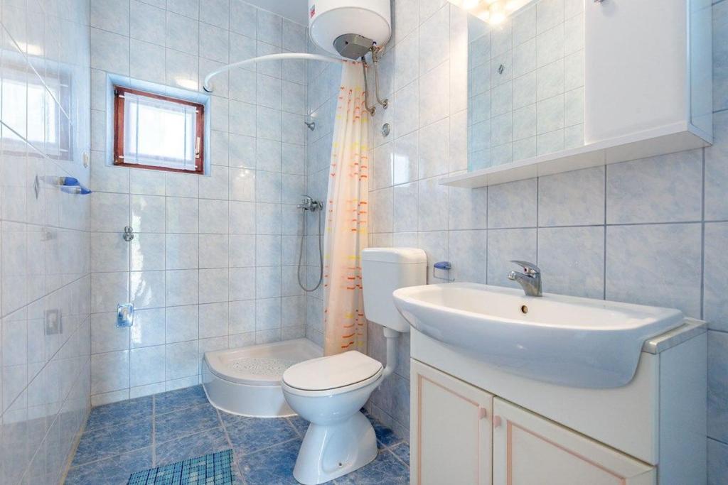 Koupelna v ubytování Apartments Vitomir
