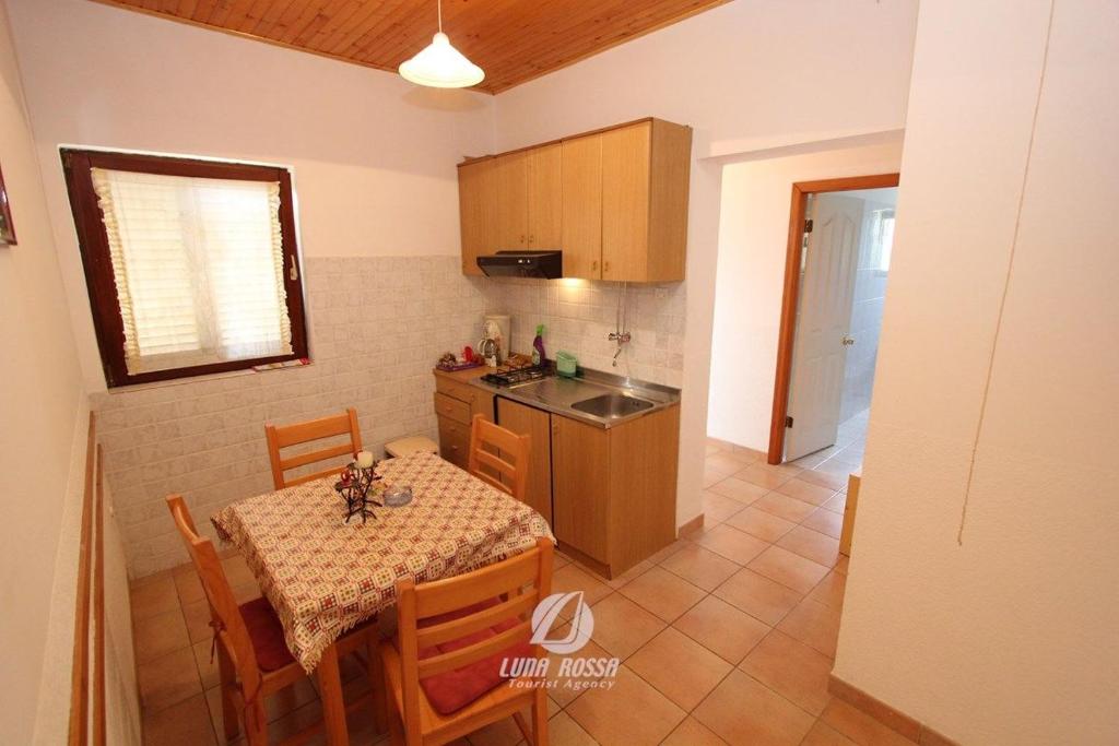 Kuchyň nebo kuchyňský kout v ubytování Apartments Vitomir