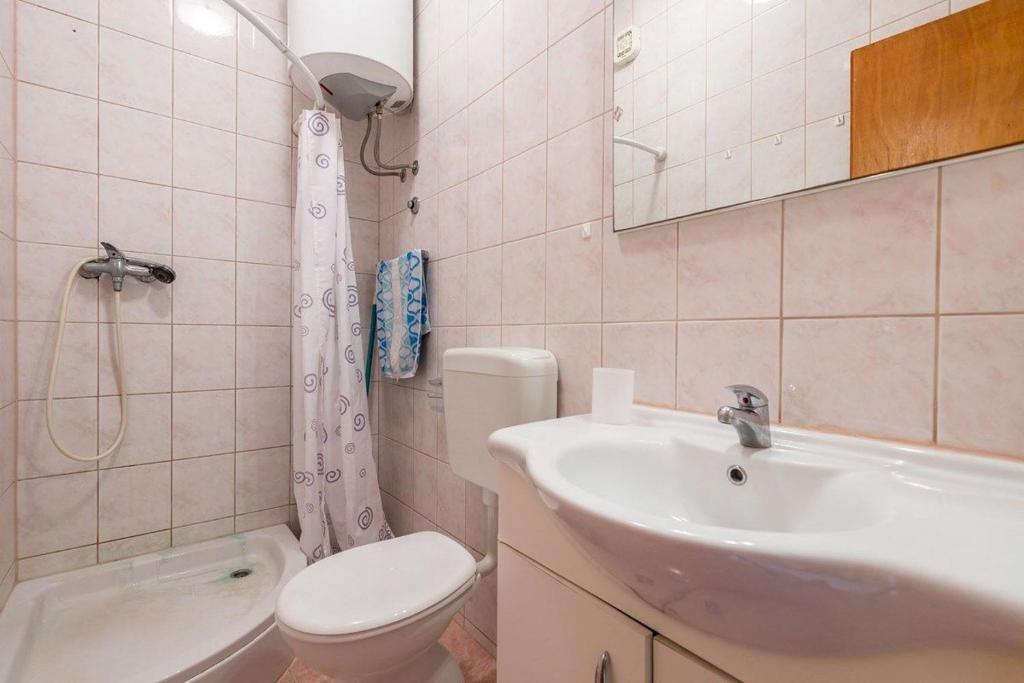 Koupelna v ubytování Apartments Vitomir