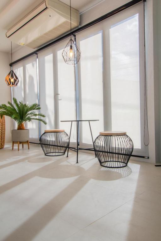 Posezení v ubytování Triple Z Hotel