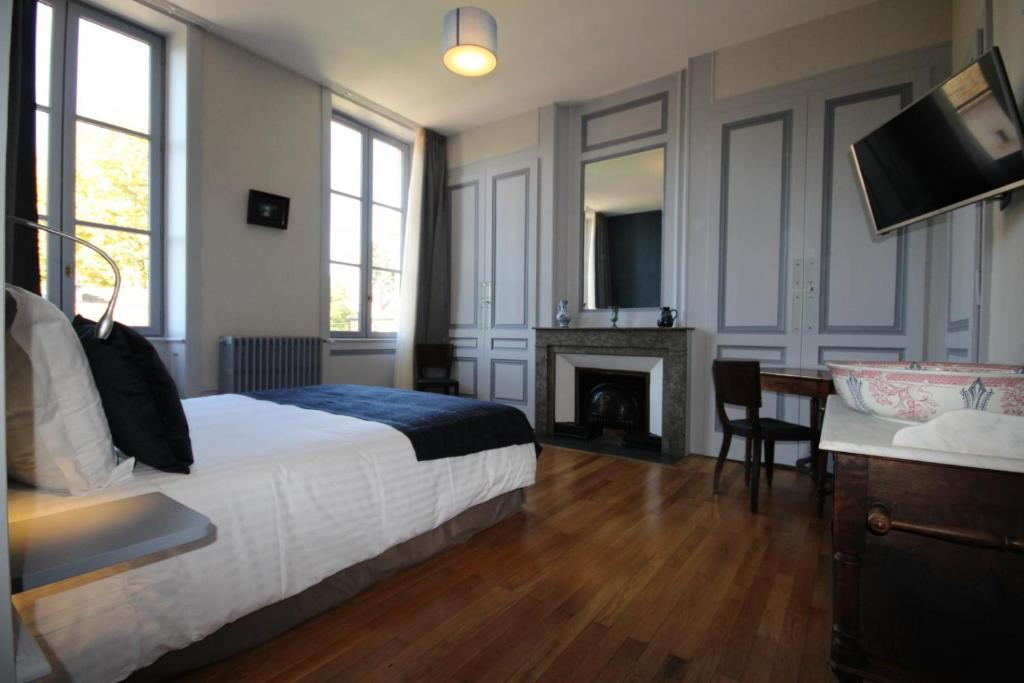 Postel nebo postele na pokoji v ubytování Chambre D’hôtes Parc Johan