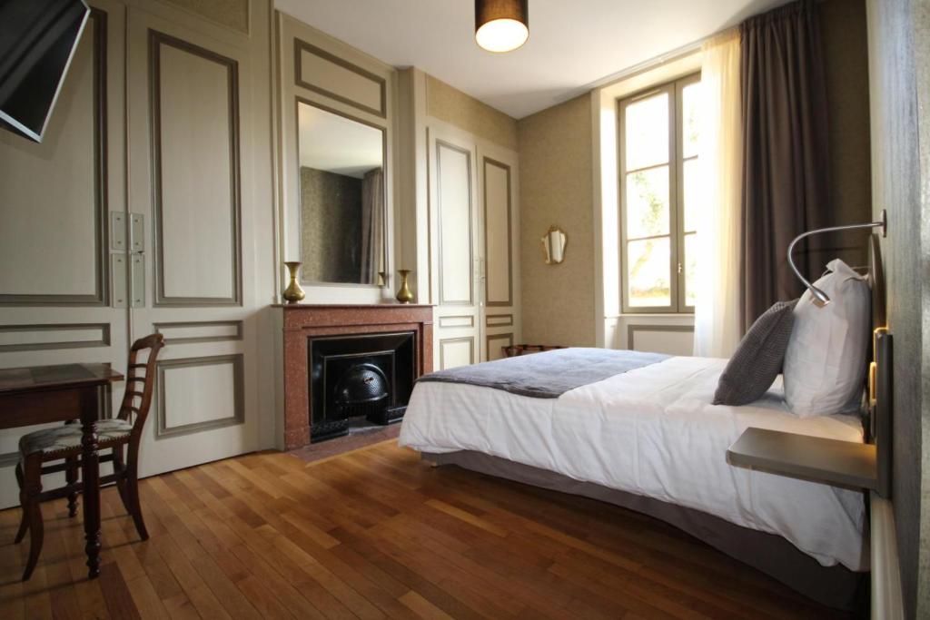 Postel nebo postele na pokoji v ubytování Chambre D’hôtes Parc Johan
