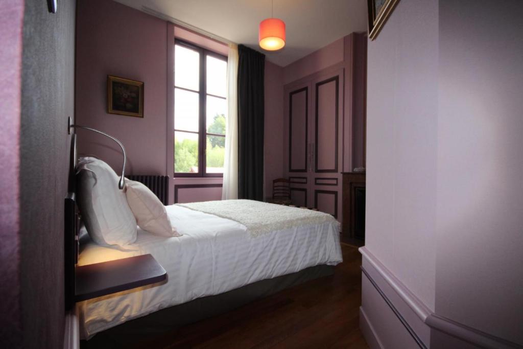 Postel nebo postele na pokoji v ubytování Chambre D’hôtes Parc Johan