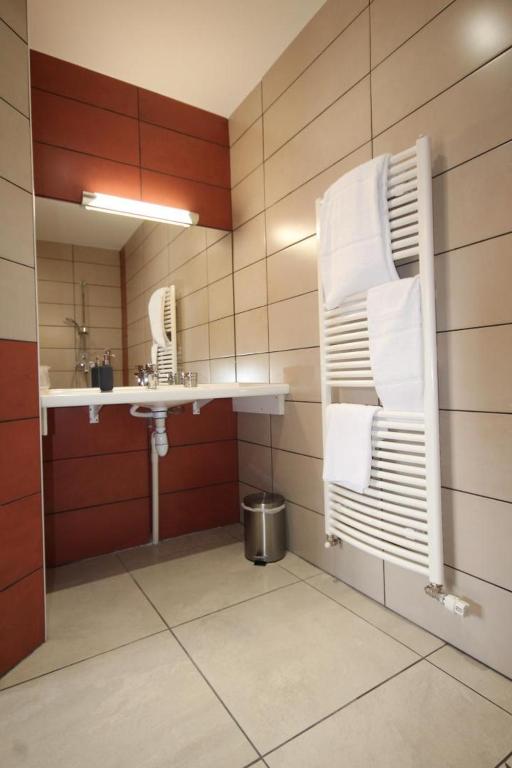 Koupelna v ubytování Chambre D’hôtes Parc Johan