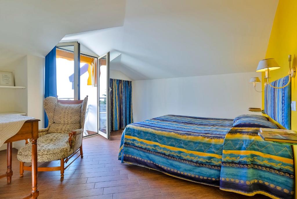 Tempat tidur dalam kamar di Cà De Rossana Bed&Breakfast