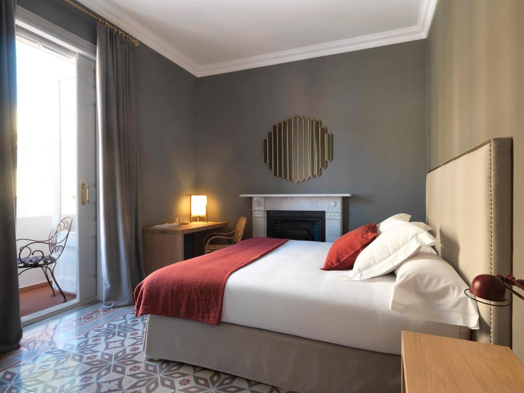 Posteľ alebo postele v izbe v ubytovaní Casa Vincke Hotel