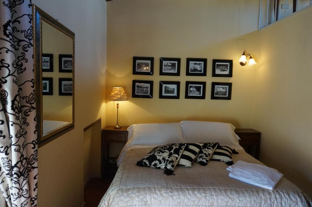 Posteľ alebo postele v izbe v ubytovaní Borgo Colleoli Resort