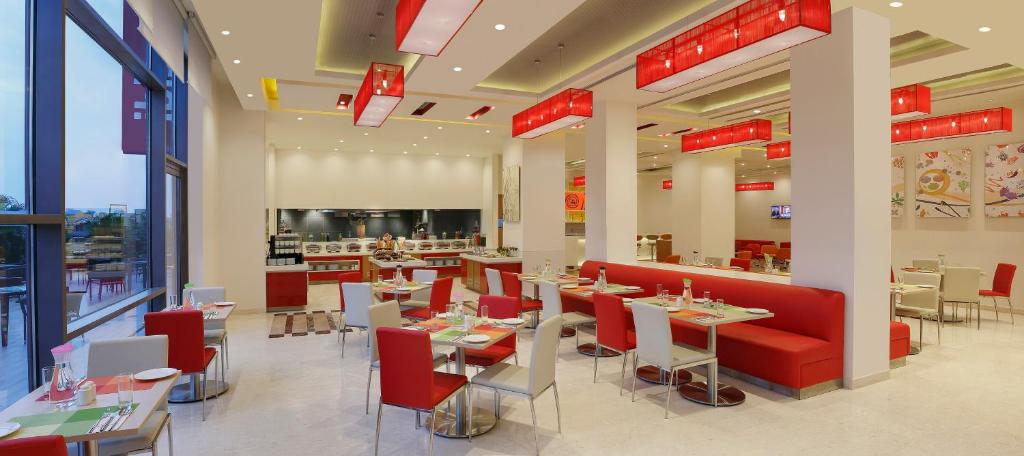 Posezení v ubytování Ibis Chennai OMR - An Accor Brand