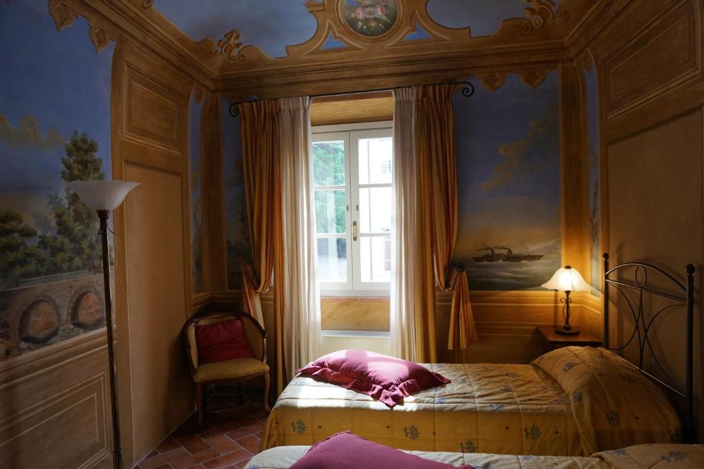 Posteľ alebo postele v izbe v ubytovaní Borgo Colleoli Resort