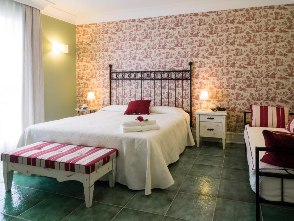 Posteľ alebo postele v izbe v ubytovaní Hotel Danieli Pozzallo