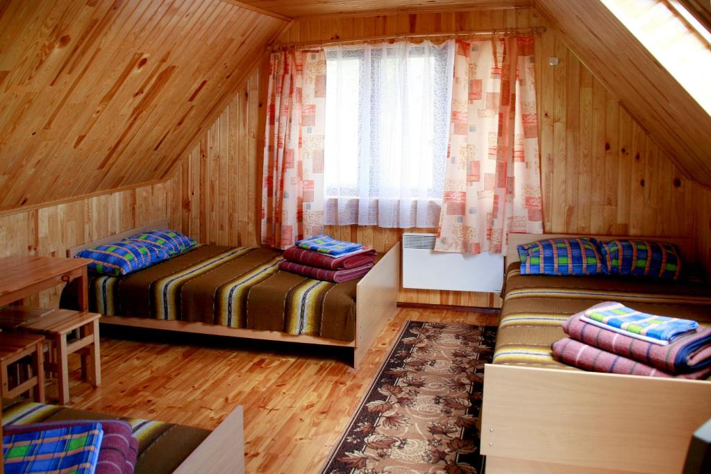 Postel nebo postele na pokoji v ubytování Selena 2003