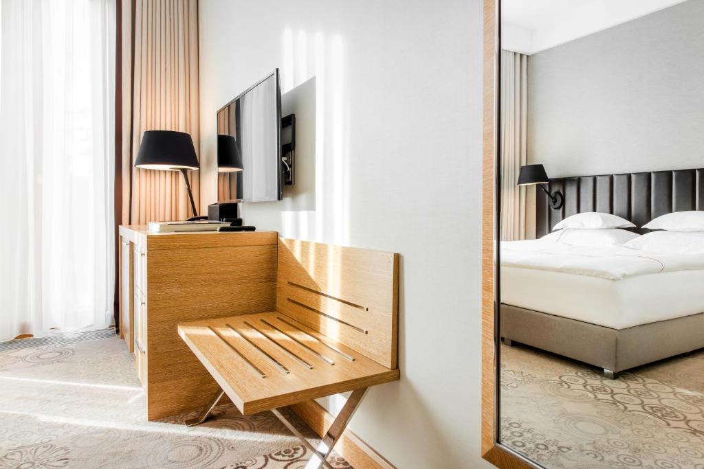 Posteľ alebo postele v izbe v ubytovaní Tiffi Boutique Hotel