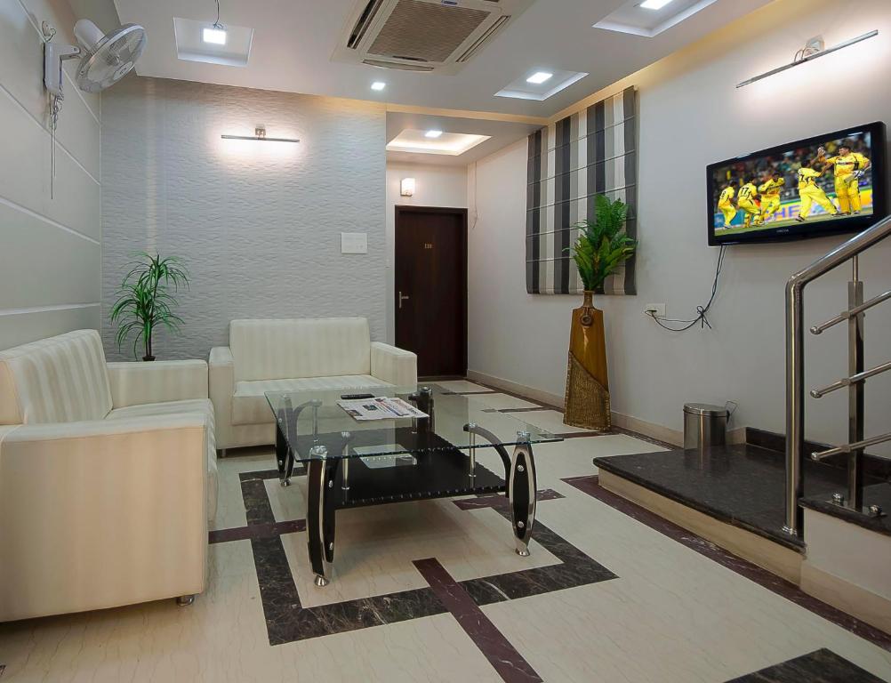 TV a/nebo společenská místnost v ubytování Hotel Central Residency
