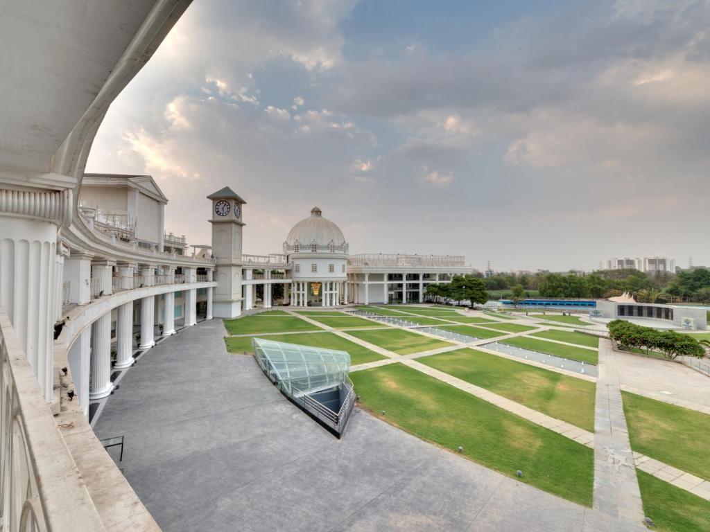 a view of a building with a clock tower at Amanora The Fern Hotels & Club in Pune