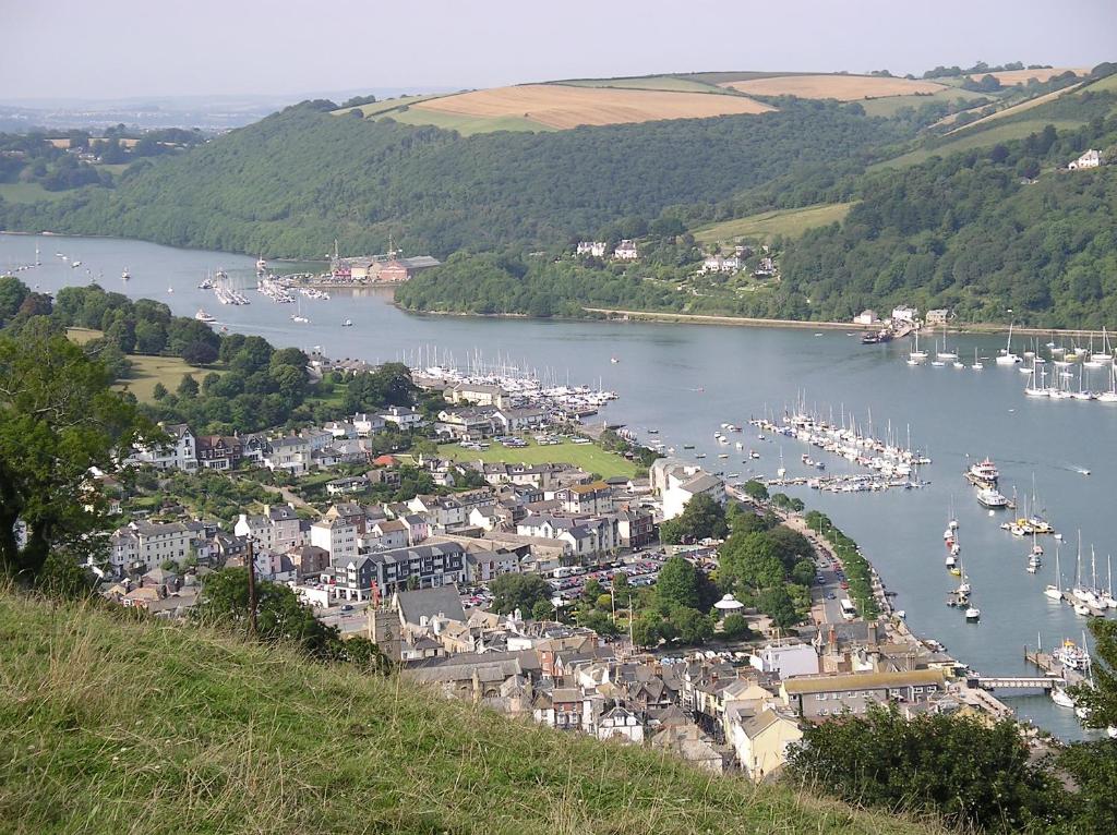 a view of a town with boats in the water at Southford House (Room Only) in Dartmouth