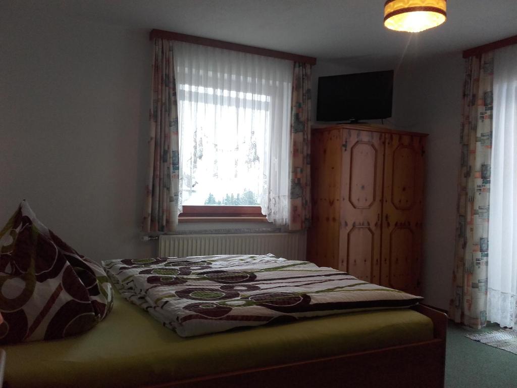 Postel nebo postele na pokoji v ubytování Rainzhof
