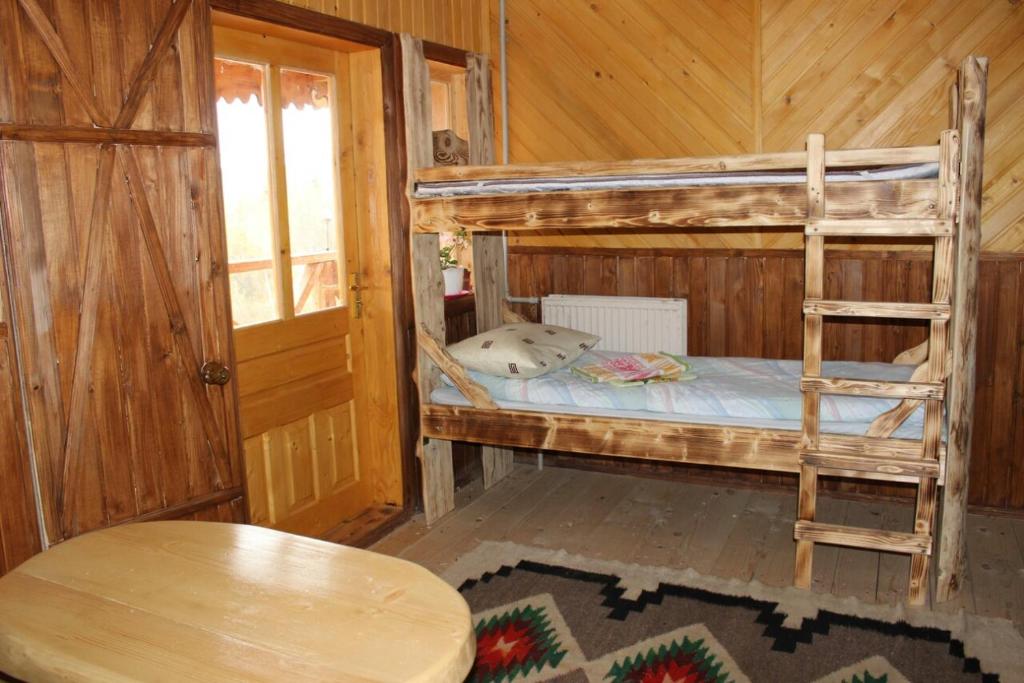 Postel nebo postele na pokoji v ubytování Skhovanka Dovbusha