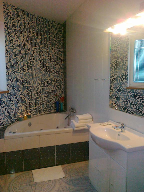 Koupelna v ubytování Family hotel Maxim