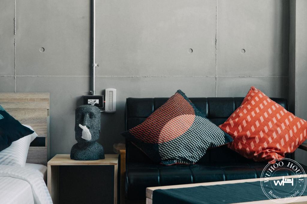 Postel nebo postele na pokoji v ubytování Wuhoo House