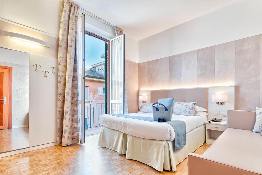 Posteľ alebo postele v izbe v ubytovaní Hotel Monte Rosa
