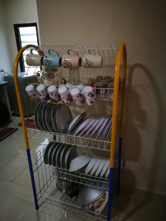 Palanda nebo palandy na pokoji v ubytování Homestay Pulau Langkawi