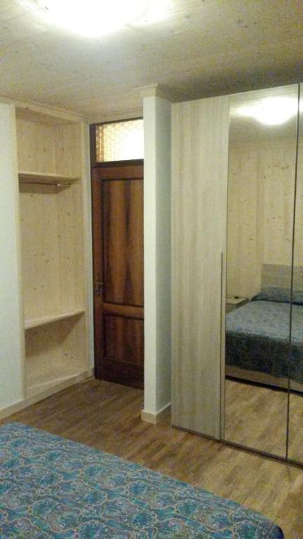 Postel nebo postele na pokoji v ubytování casa per vacanze Letizia