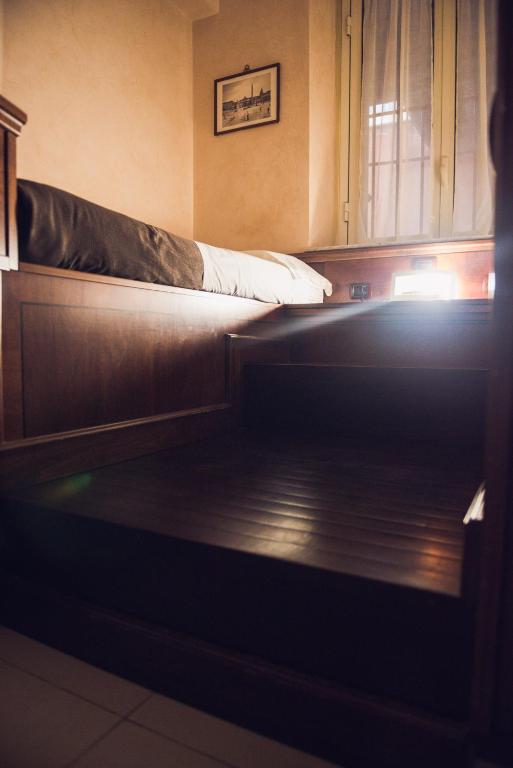 Postel nebo postele na pokoji v ubytování Hotel Robinson