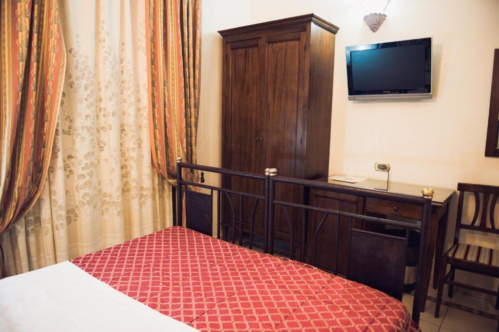 Postel nebo postele na pokoji v ubytování Hotel Robinson