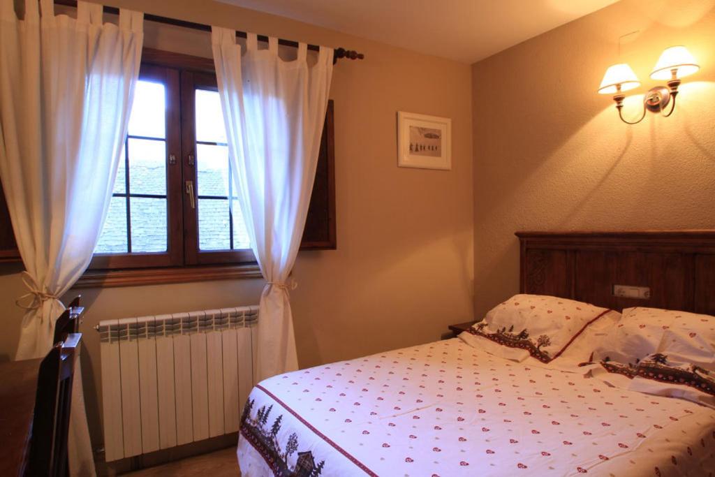 Postel nebo postele na pokoji v ubytování Hotel-Aparthotel El Reyno