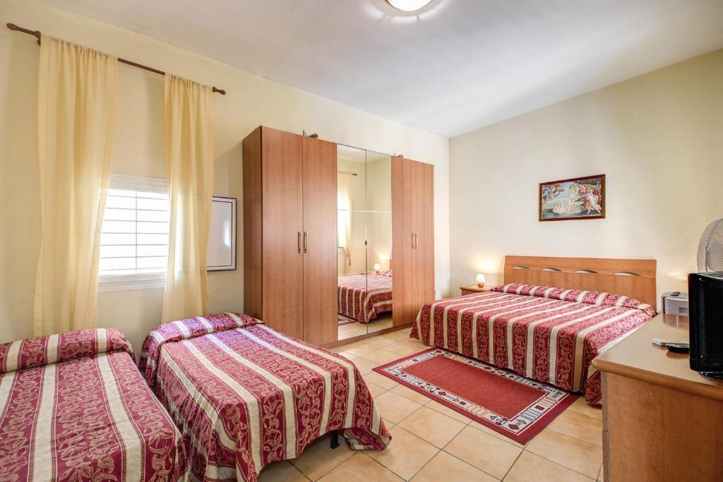 Cama o camas de una habitación en Buonarroti Suite