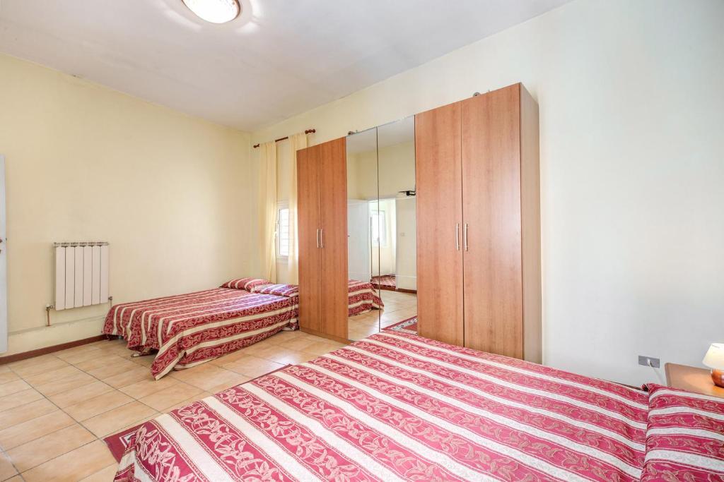 Cama o camas de una habitación en Buonarroti Suite